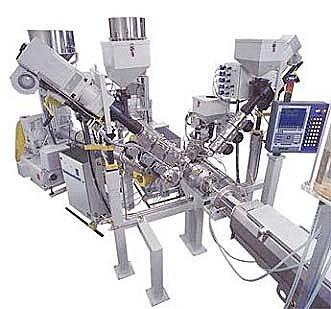 Co-Extrusion The process of extruding two or more materials through a single die