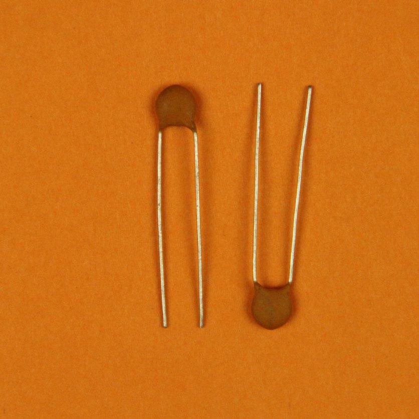 5 Capacitors Take your two ceramic capacitors. Top Tip There are two types of capacitors. Those that do care which way they are plugged in, and those that don t.