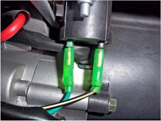 5. Testing ignition Coil 14227 COIL, IGNITION Swing arm right side Remove the black/yellow and green wires from these tabs and check