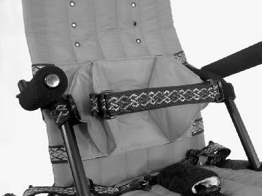 42 Fig.43 The trunk support is attached to the chair with straps that wrap behind the seat back and connect with Velcro. Fig.43 Support is achieved by pulling each triangular flap toward the appropriate side, then securing it by wrapping the strap around the frame and attaching with Velcro.