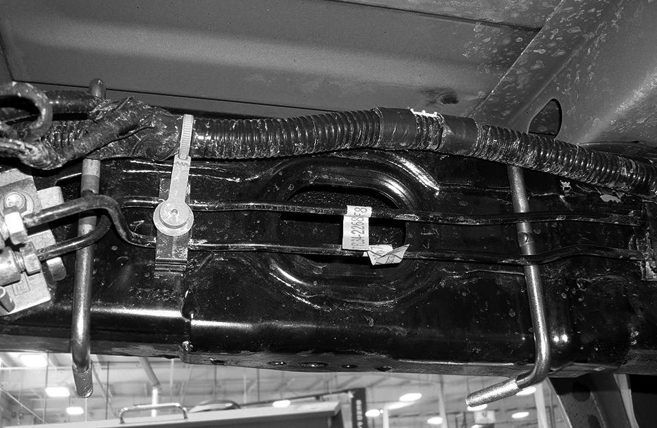 RideControl Figure 5 shows U-bolt (D) being installed on the inside of the left (driver-side) frame section