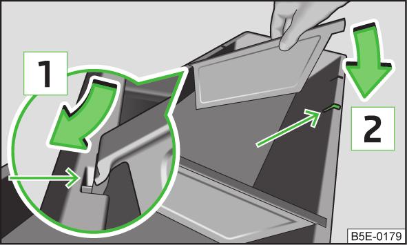 5 kg. Prevent objects stored in the storage box from slipping at all times using the lateral carrier rails. Fig. 79 Storage box: inserted/removed Clothes hooks Fig.