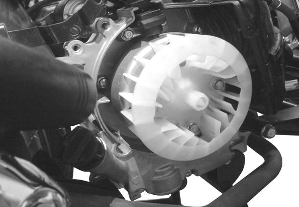 When the engine is running at idle speed, the ignition timing is correct if the F mark on the flywheel aligns with the index mark on the crankcase.