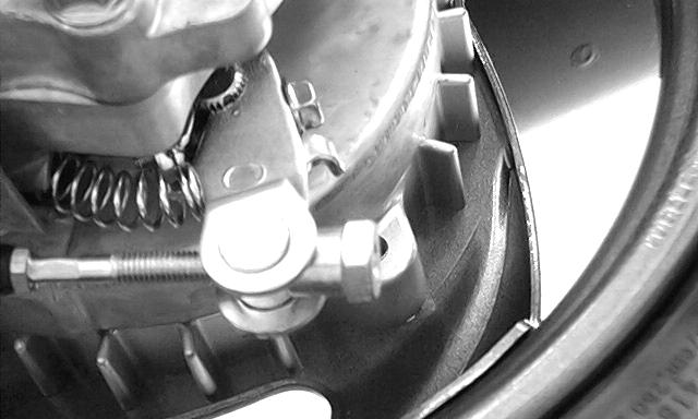 nut. Adjusting Nut BRAKE FLUID Turn the steering handlebar
