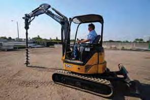 UIPMENT Mini Excavator -w/dangle Auger For tight access locations where conventional drills will not fit.