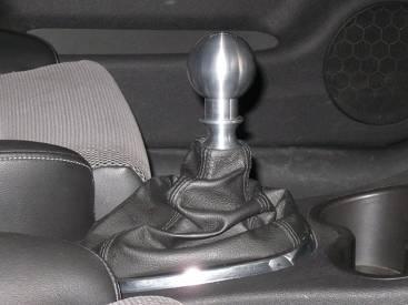 If the insert was adjusted correctly the engraving will line up properly. If the engraving does not quite line up properly, remove the shift knob and re-adjust the insert and jam nut to line it up.