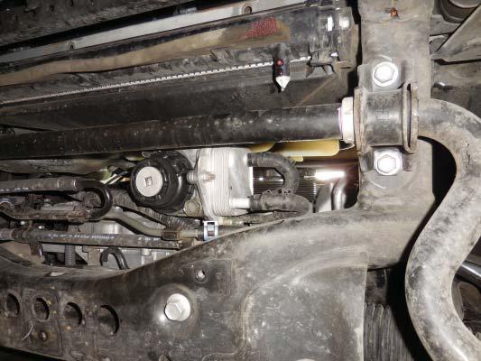 Slide the compressor away from the engine while keeping it on the 2 studs. You do not need to remove the compressor. 44.