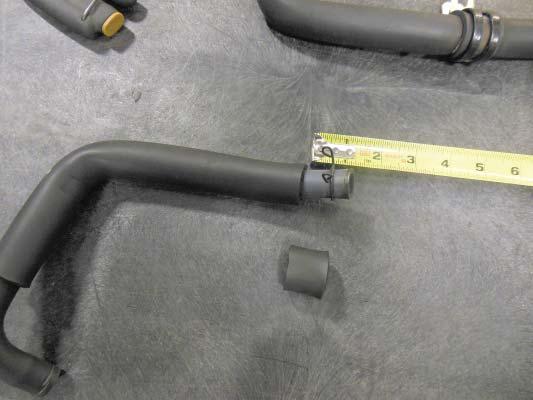 145. Remove one inch of insulation from the shortened side of the hose to allow room for the OEM clamp to