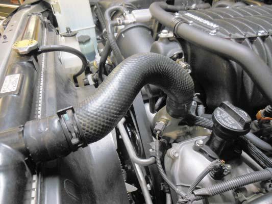 153. Reconnect the radiator hose. Flip this hose end for end from its original location.