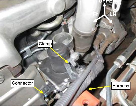 4) Open the engine hood and disconnect the battery negative terminal, remove the batteries and tray.