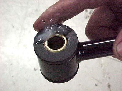 Take the 7/8 bushings and grease the inner surface with the