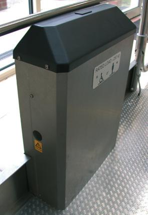 b) In the event that the lift stops part-way through its travel and will not restart, it can be lowered by removing a round blanking plug on the right side of the box on the platform and pressing the