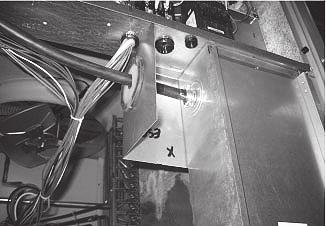 Install the single point box under the control panel with two screws down through the control panel (Fig. 20) and one screw into the center post. (See Fig. 20.) Holes have been provided.