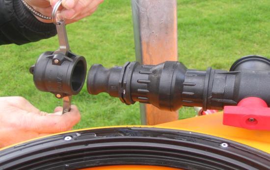 Place self filler hose in water tank. Start tractor and engage PTO shaft.