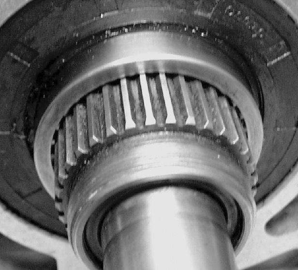13. Apply a small amount of ** lube to the inside of the main drive gear. No.33344-94 NOTE: If you have removed the mainshaft protective cover already, install a lubed tool JIMS No.