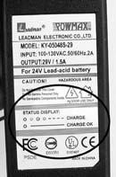Figure 7a Figure 7b The charger has a small window with a LED to indicate the charge status (Figure 7b).