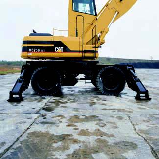 Caterpillar M2B Wheeled Material Handler Tough, dependable, and loaded with performance-improving features. Controls.