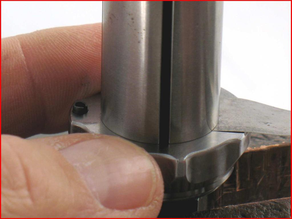 .001"-.0015" (~0.03-0.04 mm) 2. By hand, install the 04081 Rotor Nut.