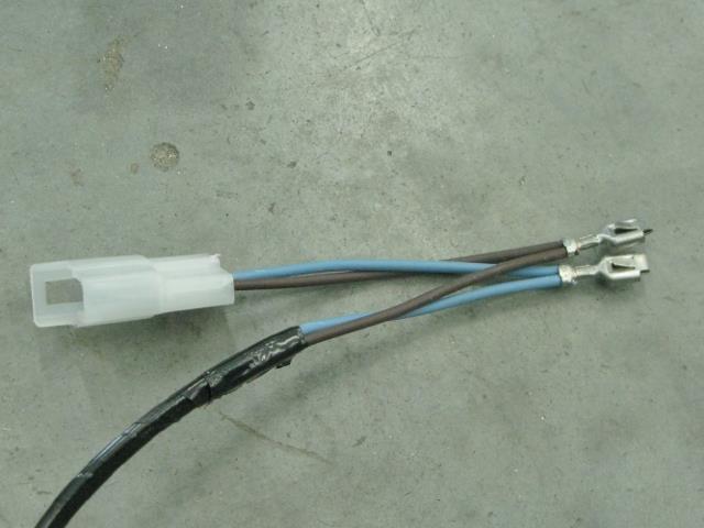 Remove existing brown wire terminal and install brown wire terminal from new harness Remove existing light blue or yellow wire terminal and install light blue wire terminal from new harness Figure 34