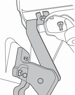 The lower part of the bracket should rest against the rear of the Idler Linkage.
