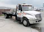 2003 IH 4300 Roll-Off Tow  , 20' Steel Bed w/cable Winch, Rear Lift