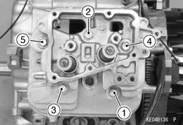 chapter) Unscrew the rocker cover bolts in the order shown [1 to 5]. Remove the cover [A] and the gasket. When removing the #1, #2 cylinder head, set each piston at the top dead center (T.D.