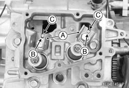5-12 ENGINE TOP END Cylinder Head Install the rocker arm brackets [A] so that bracket hollows [B] fit to the cylinder head projections [C].