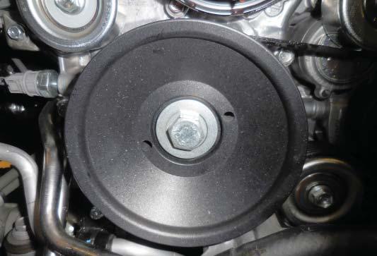81. Install the supplied crankshaft pulley in front of the existing crankshaft
