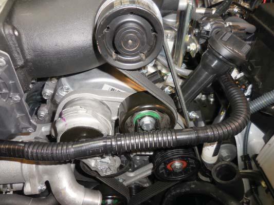 173. Wrap the cable ties around the OEM air injection hose and secure