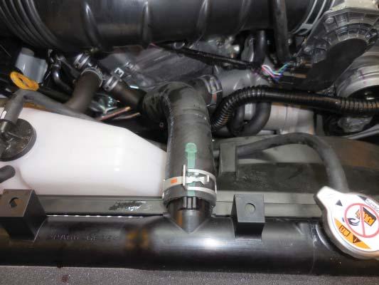 This will give it clearance away from the charge air cooler hoses. Section 11: Coolant Fill and Vehicle Testing 287.