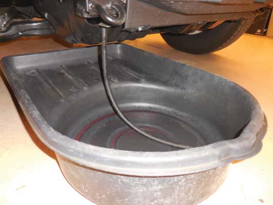 The valve is shown with a red arrow.