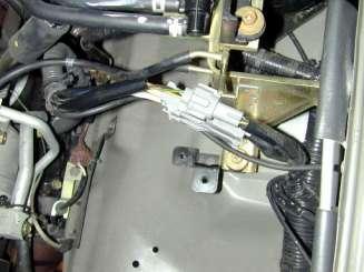 m. Bend the wire plug holders as shown in the picture, this will allow additional clearance for the heat shield. 3.