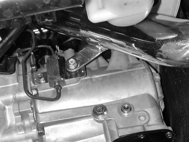 Be sure that the bracket and intake are not in contact with the clutch lines or slave cylinder.