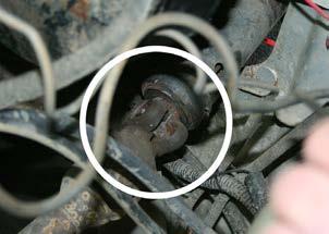 (Figure 6) Though it is possible to pull the column through the hole in the dash with the mount still attached, it is easier to do if you remove the electric part of the ignition