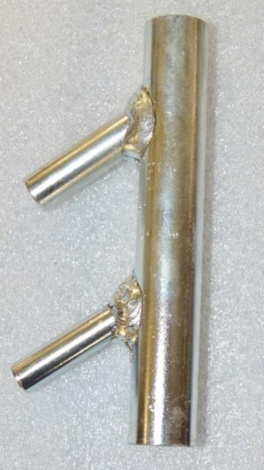 (Fig. 13) Vent Line Filler Neck Adapter (99 0000 0409) with 5/8 barrel with 3/8 and 5/16 barbs. (Fig. 14) Under the vehicle, showing the Vent Line Filler Adapter installed in the vehicle s vent line.