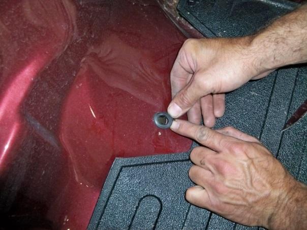 5 Install the two Mounting Brackets in the bed of the vehicle and install washers and nylon locknuts, finger