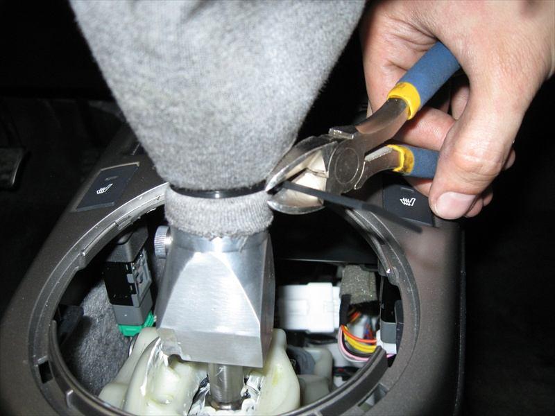17 46. Install the stock shift boot on the reverse lock handle.