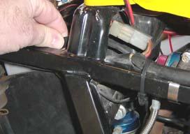 Install the ground wire under the mounting screw for the blinker mount and tighten.