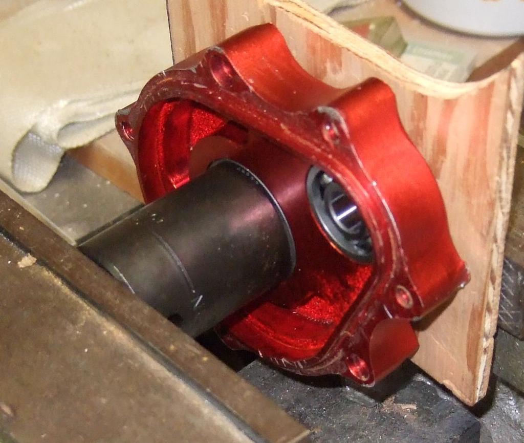Figure 16: Pressing the output shaft bearing into the case Re-seat the main gear in its pilot bearing in the case so that it properly engages the pinion gear.