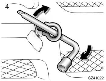 Tighten the front towing eyelet securely by a wheel nut wrench.