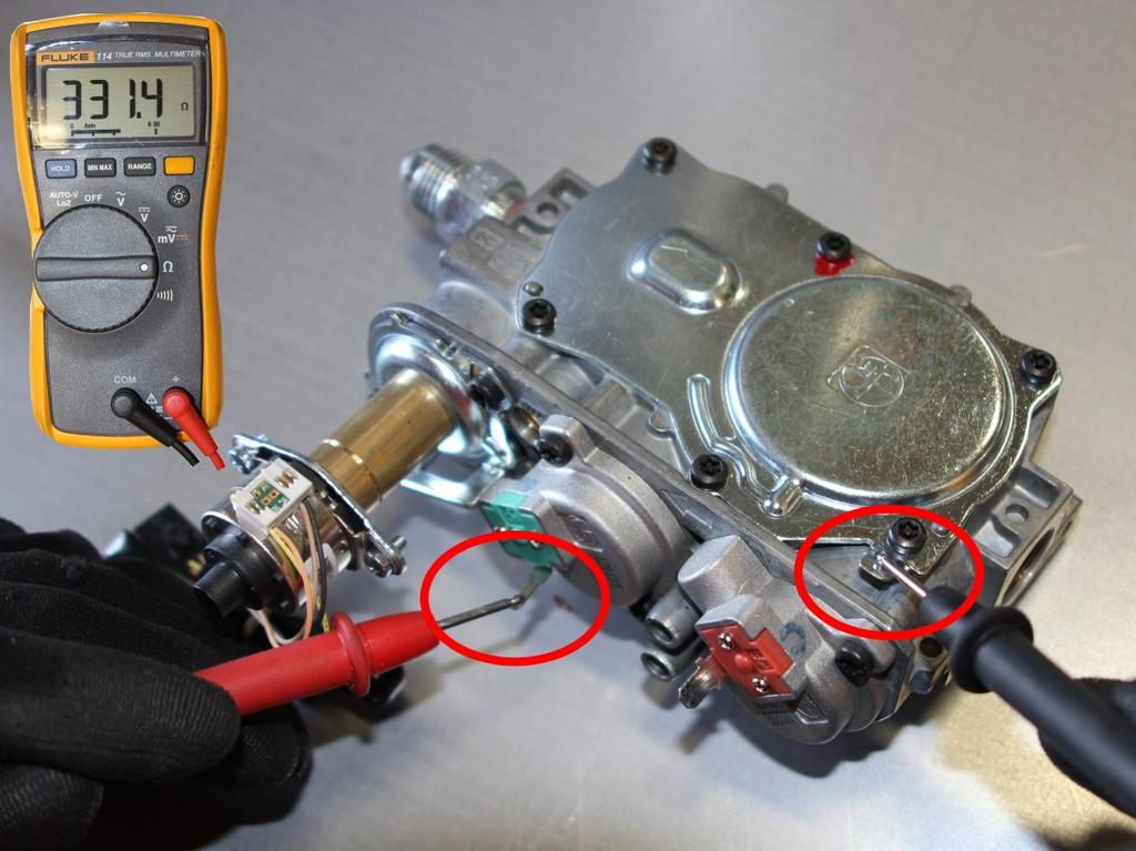 Your multimeter would need to be in the Ohms position and disconnect the wiring harness from EV1 and EV2.
