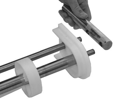 Install the pinch guard (Figure 67, item ) to each side onto idler shaft (Figure 67, item ) and pinch guard shaft (Figure 67, item ). Figure 68.