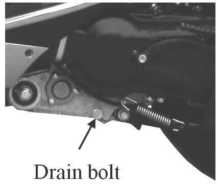 Remove the drain bolt (1) at the left side of the crankcase. 3.