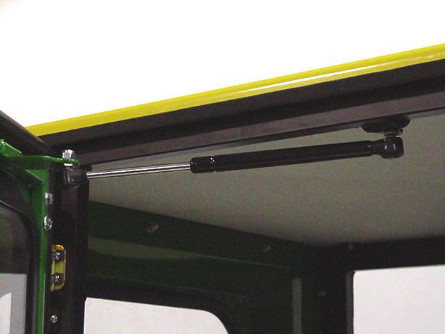 2 On hard sided cabs install the gas springs to the frames and doors with the small piston end towards the door. (See fig. 10.