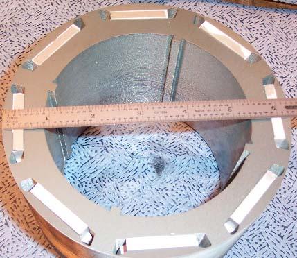 The PMs with the polymer coating are inserted into the slots of the rotor core.