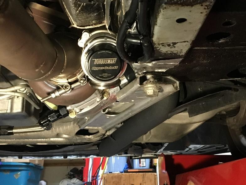 Install intake piping and tighten clamps using a 10mm deep socket and