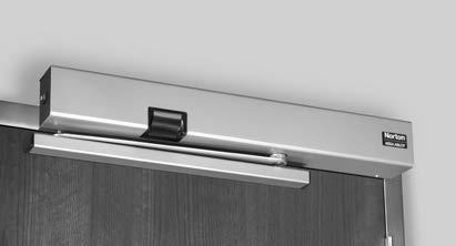 PULL SIDE Surface mounted to the pull (hinge) side frame face Slide track mounts directly to door Minimum 4" ceiling clearance required 1/8" (3mm) maximum frame reveal Handed Standard units
