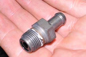 Using the 19mm socket, ratchet and