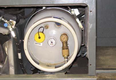 OPERATION CHANGING THE LPG TANK FOR SAFETY: Before leaving or servicing machine, stop on level surface, set parking brake, turn off machine, and remove key. 5.