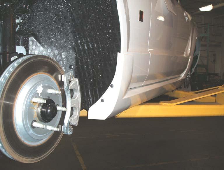 10. Install front rocker flange fasteners (Scrivet, 6.3 x 23mm). (Figure G) 11. Re-install rear wheels on vehicle.
